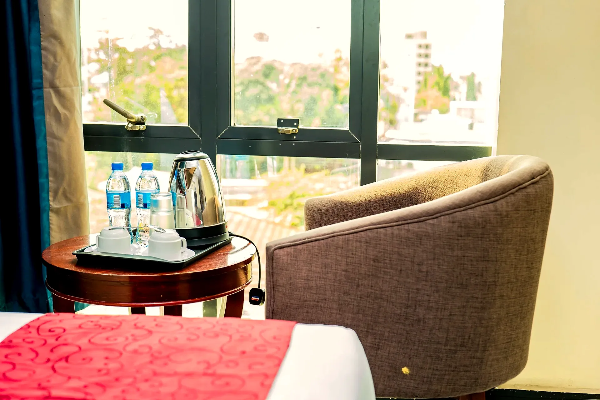 Tea and coffee tray by the window in a suite